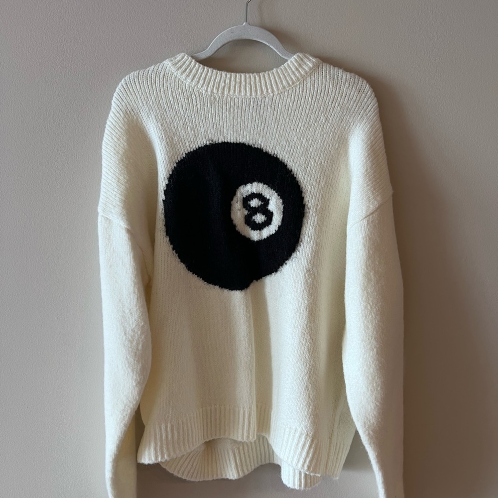 Stylish White Sweater with Black Graphic